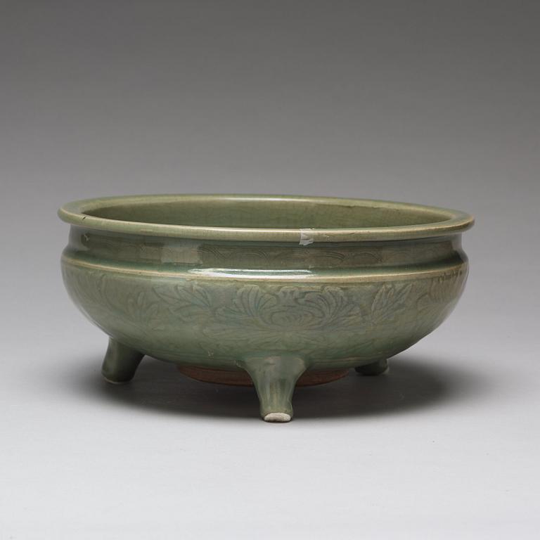 A celdonglazed tripod censer, Ming dynasty (1368-1644).