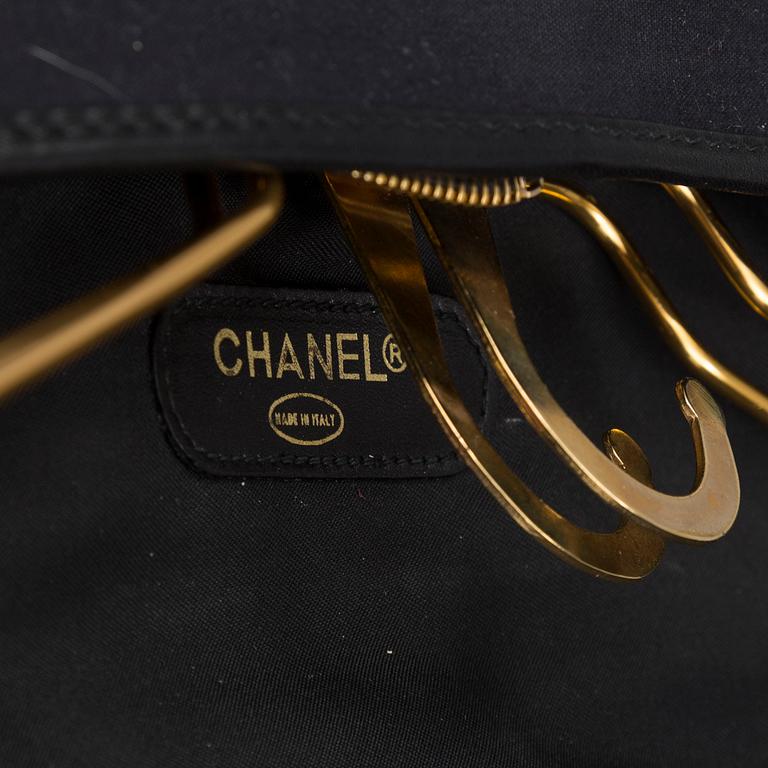 a CHANEL garment bag.