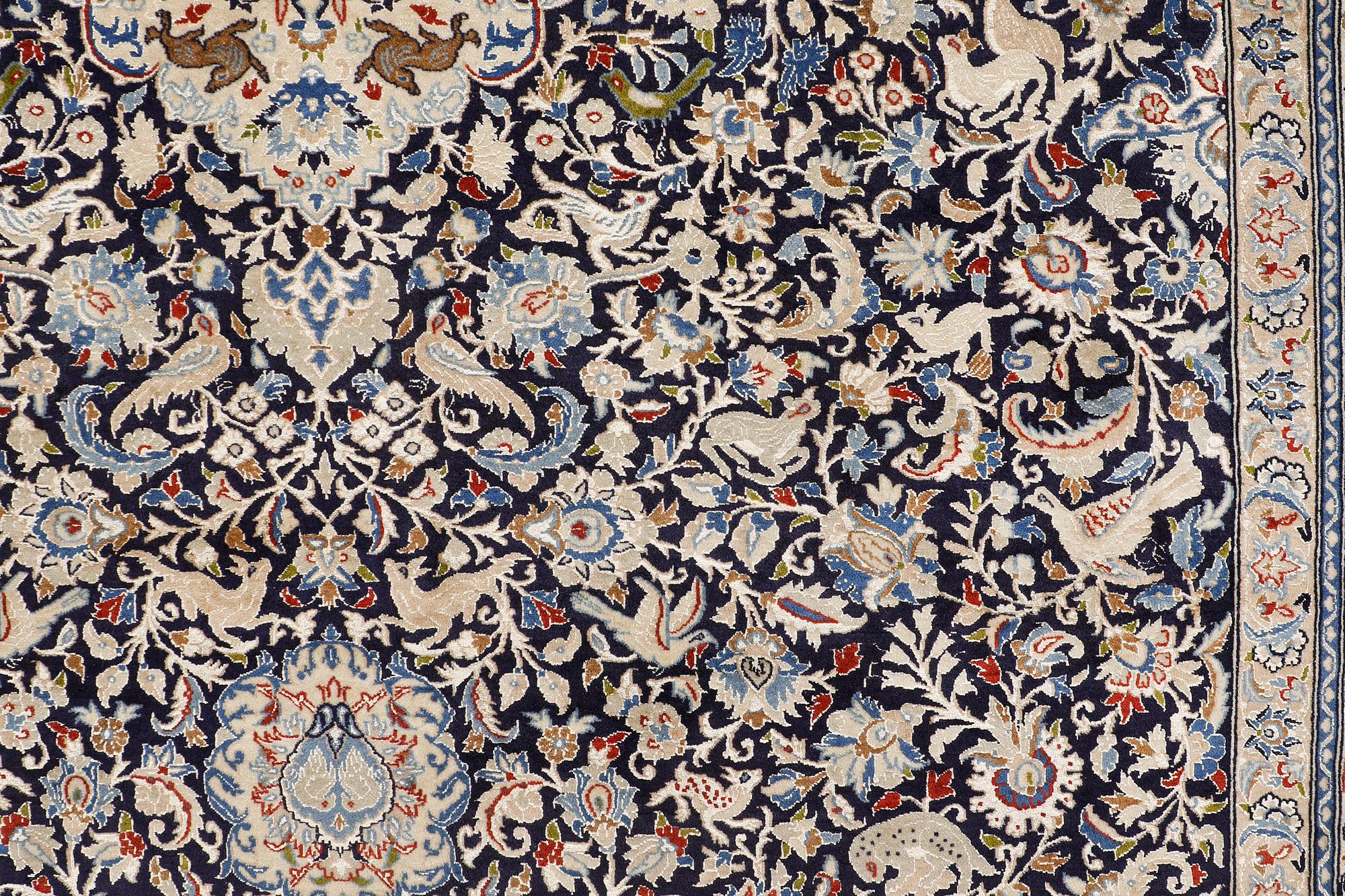 A Nain carpet, part silk, so-called 6 LAA, approx. 324 x 210 cm.