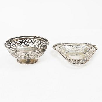 Two pierced silver bowls and two sugar spoons, including Sweden and Endland, 20th century.