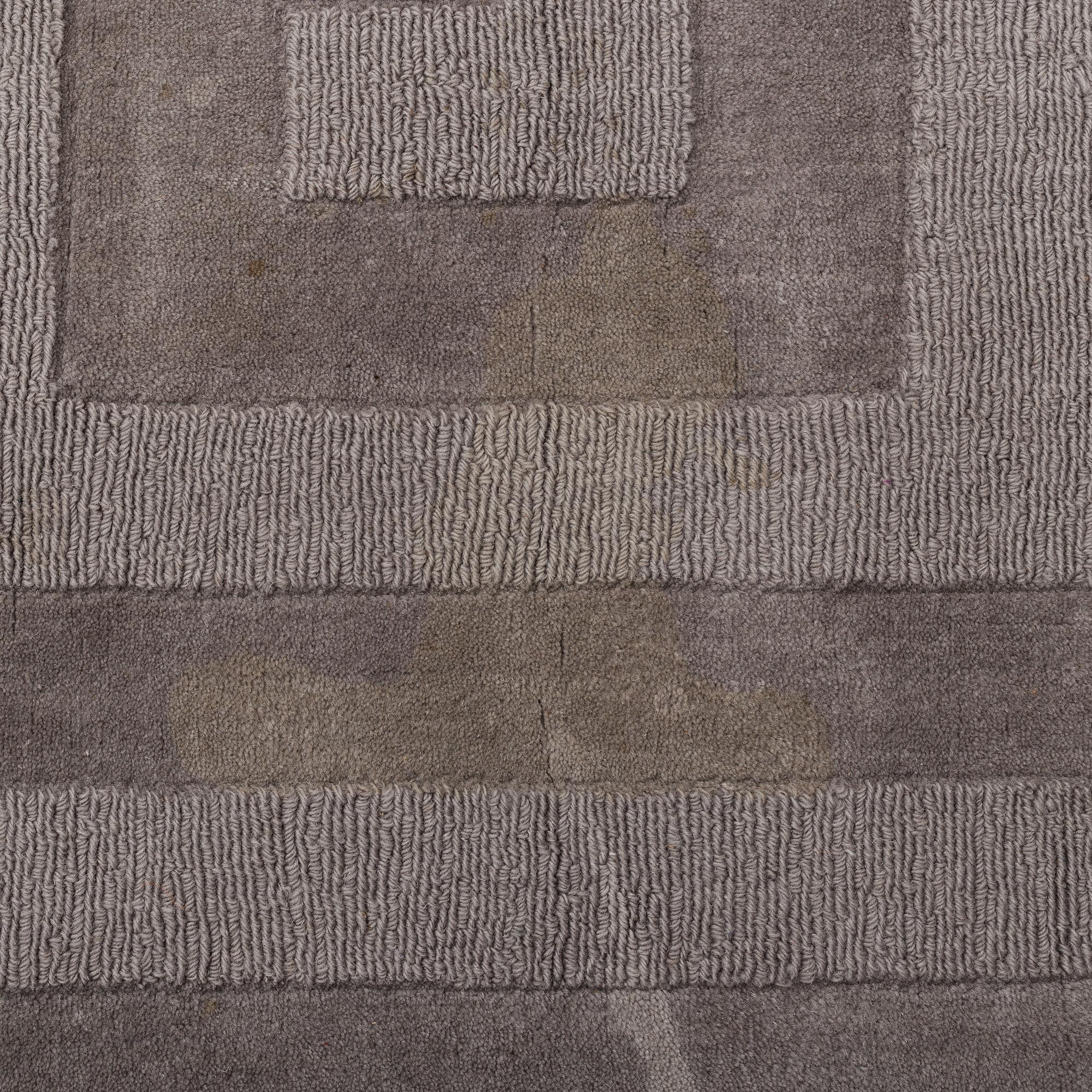 A Layered "Wool Cubes" carpet, 390x620 cm.