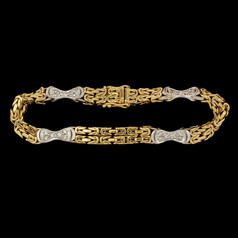 ARMLÄNK, 18k guld och vitguld med 24 små briljantslipade diamanter, tot 0.43 ct, importstämplat. Vikt 28 g.