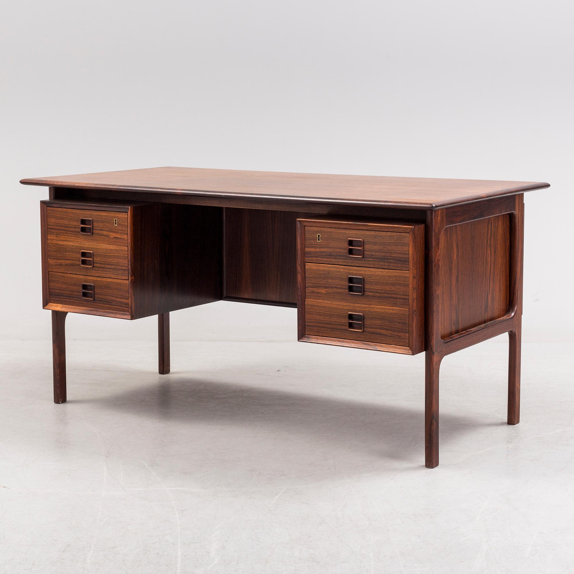 A 1960´s  Danish writing desk veneered with jakaranda, possibly designed by Arne Vodder.