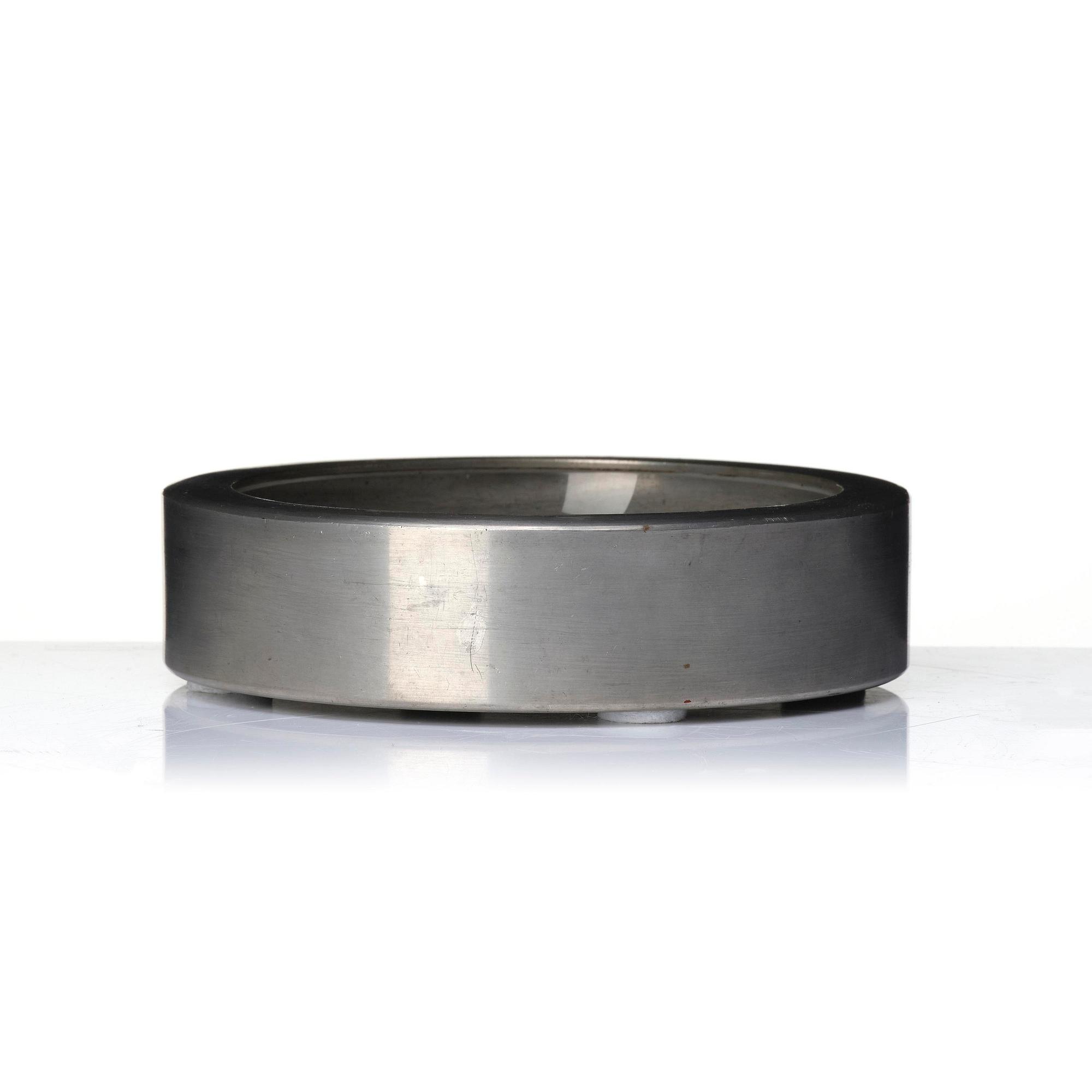 Firma Svenskt Tenn, a pewter and glass ashtray/bowl, Stockholm, 1950.