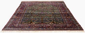 An antique silk Kashan carpet, central Persia, c. 319 x 206 cm.