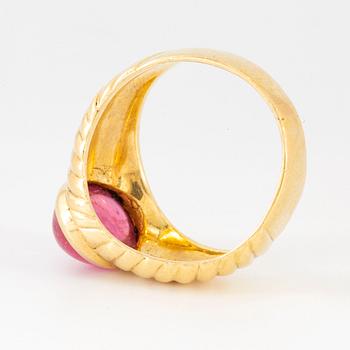 Cabochon-cut pink tourmaline ring.