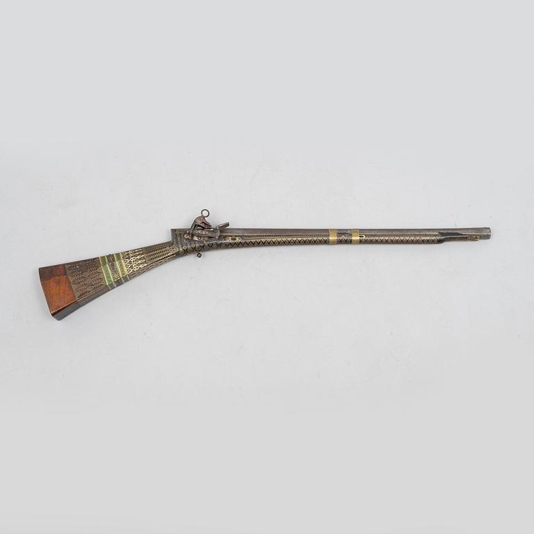 A Persian snaphaunce rifle, 18th century.