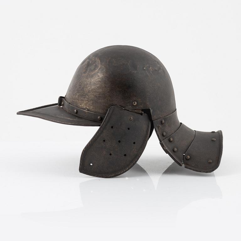 A 20th Century copy of a Lobstertail helmet.