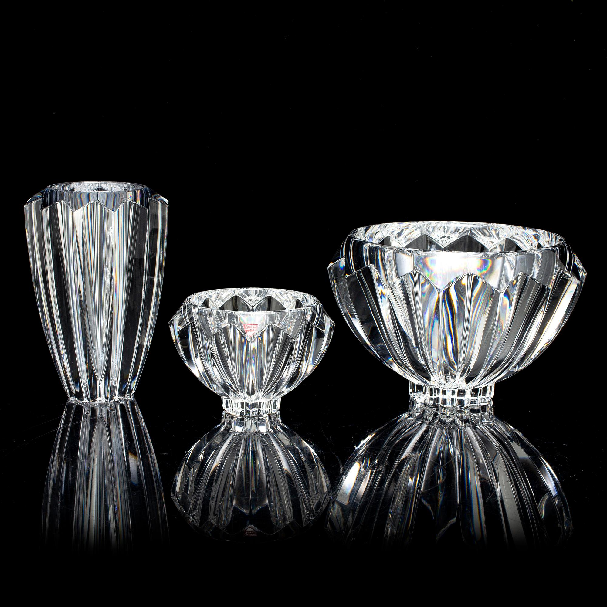 ERIKA LAGERBIELKE, a glass 'Zodiak' vase and two bowls from Orrefors.