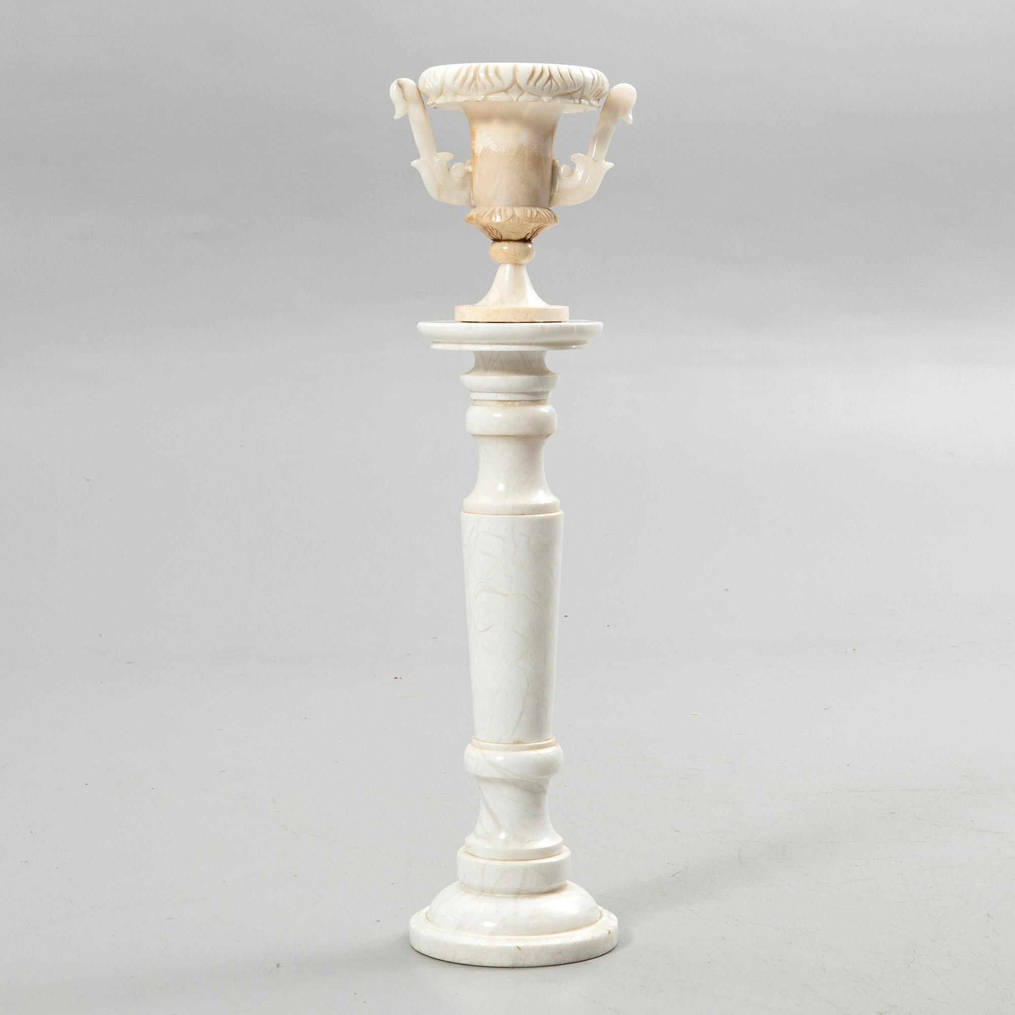Pedestal with urn, 20th century.