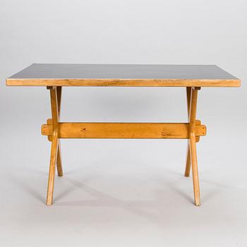 ILMARI TAPIOVAARA, A 1940s X-LEGGED TABLE for Keravan Puuteollisuus, Finland.