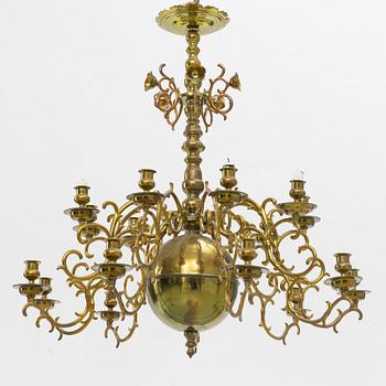 A baroque-style brass eighteen-branch chandelier, late 19th century.