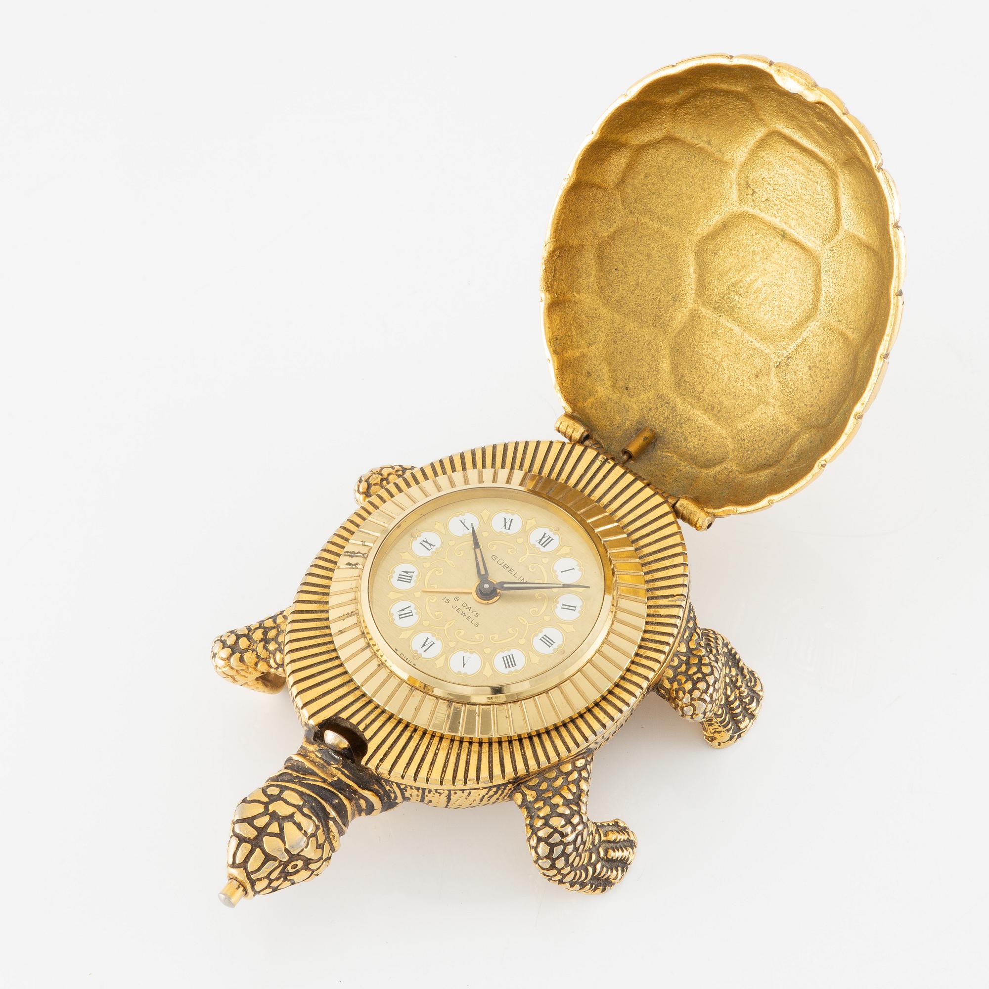 Gübelin, table clock, approx. 12 x 8 x 3 cm.