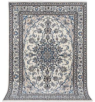 A Nain rug, part silk, c. 242 x 165 cm.