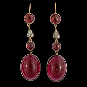 52. A pair of cabochon cut garnet, red paste and diamond earrings.