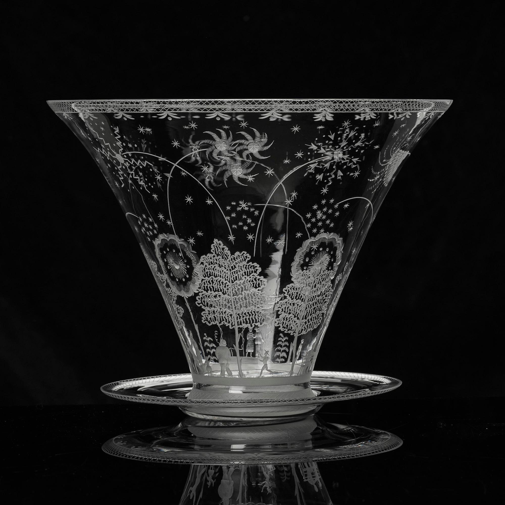 Edward Hald, a Swedish Grace "Fyrverkeri" (Fireworks) engraved glass bowl with a plate, Orrefors, Sweden, 1925, model 248.
