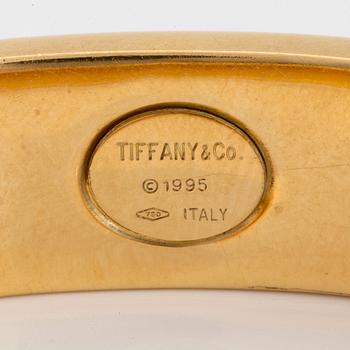 A Tiffany bangle "Atlas" in 18K gold.