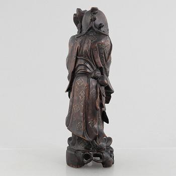 A Chinese wooden figure of 'Shoulao' with silver inlays, 20th century.