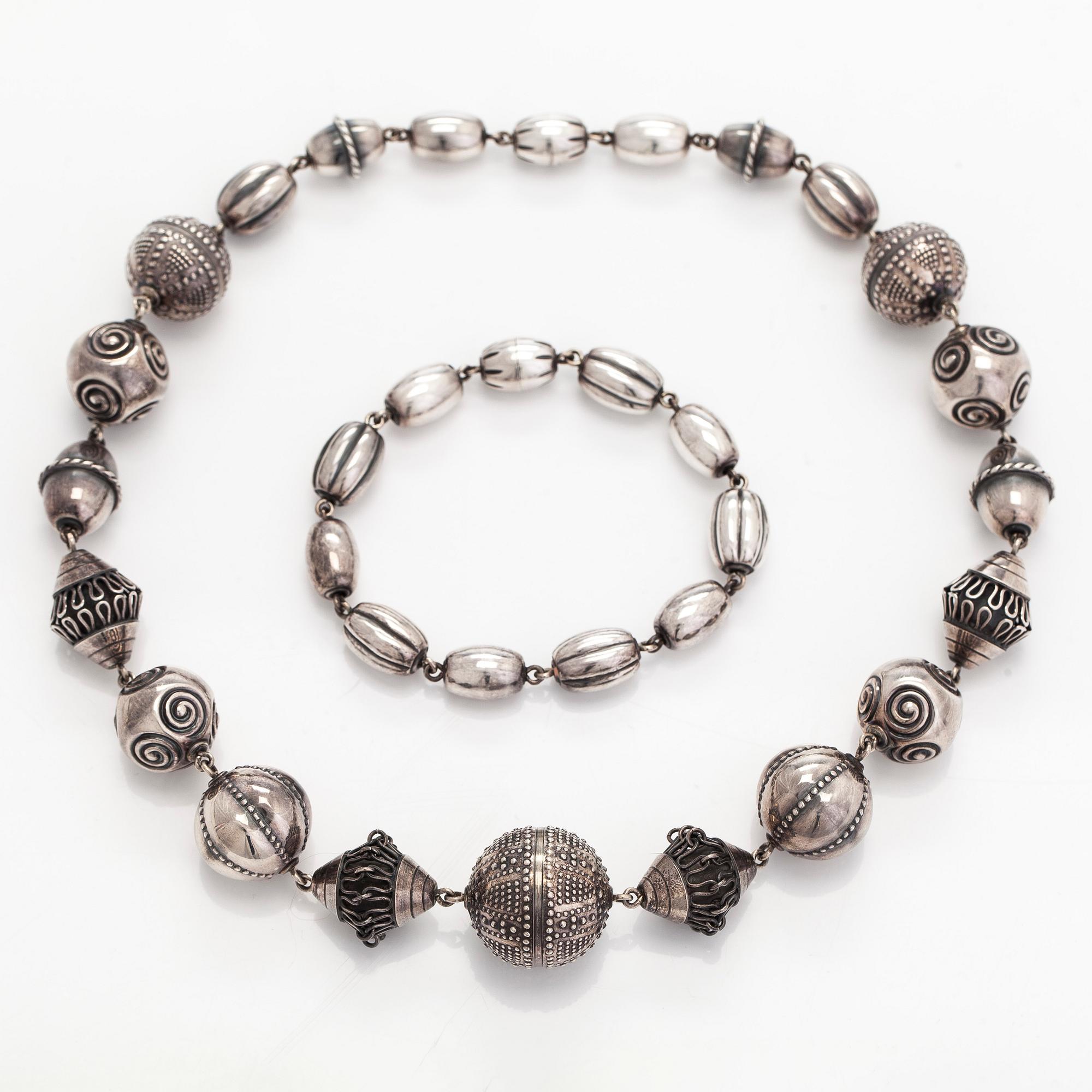 Kalevala Koru, "Halikon kääty", necklace and bracelet, silver, 1988.