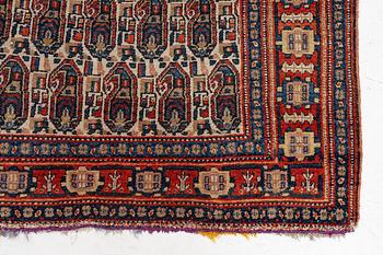 An antique Senneh rug, c 192 x 140 cm.