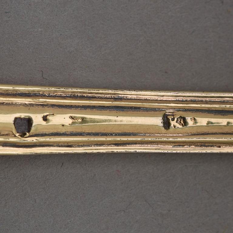 A five piece set of silver-gilt travel-cutlery, unidentifiable makers mark, Paris 1798-1809, in original box.