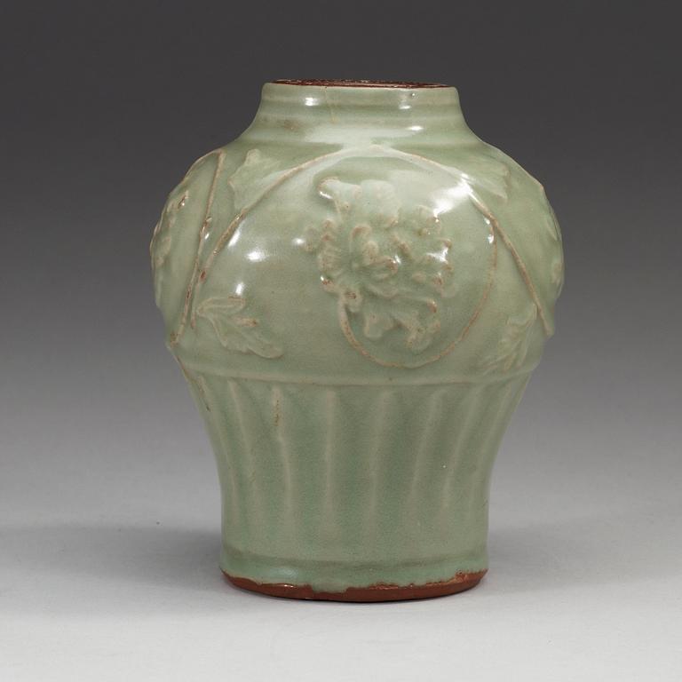 A celadon glazed vase and dish, Yuan/Ming dynasty.