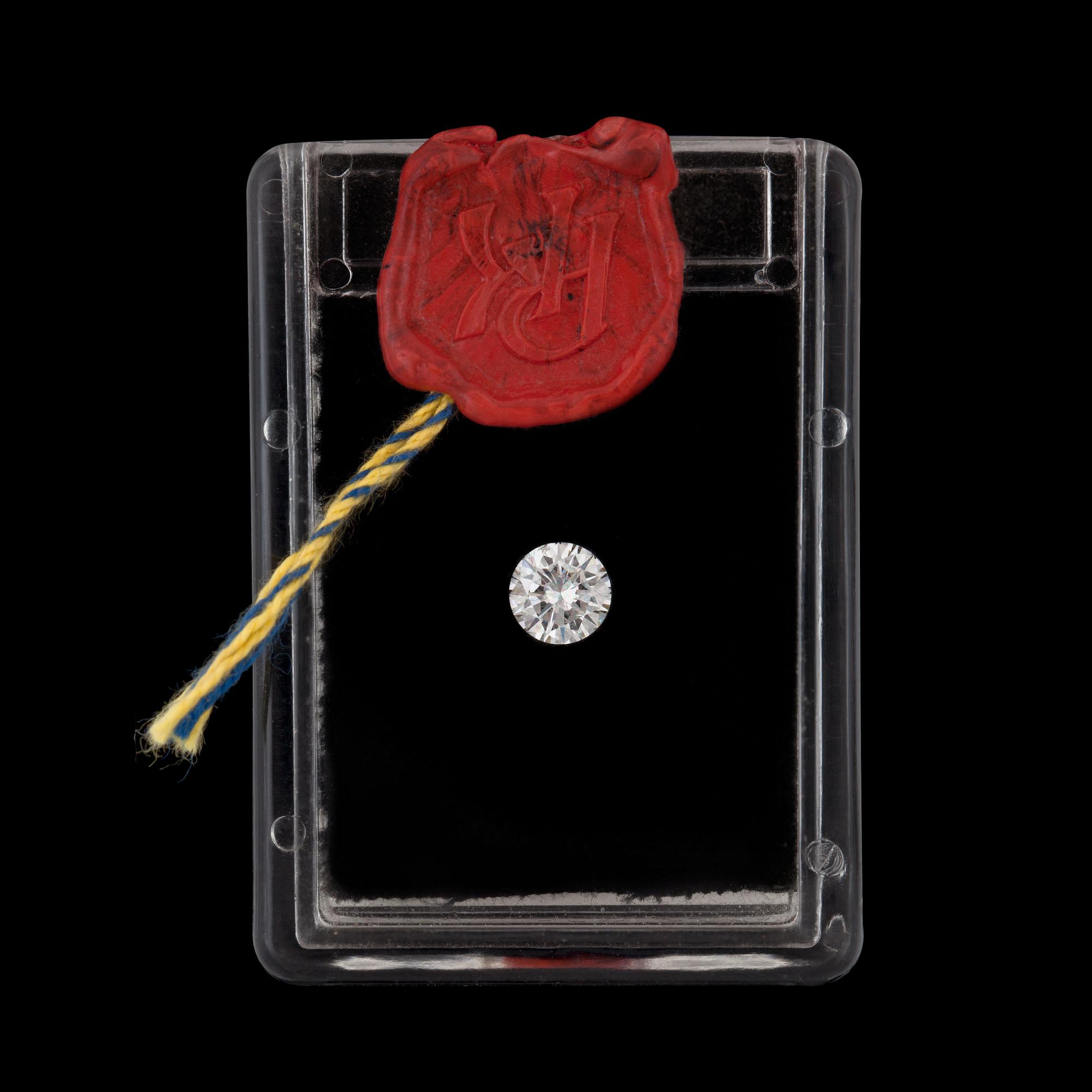 A loose diamond 1.01 cts. H/SI1 according to certificate from goldsmith.