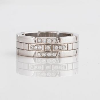 A brilliant-cut diamond Cartier ring.