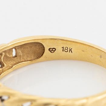 18K gold and small diamond ring.