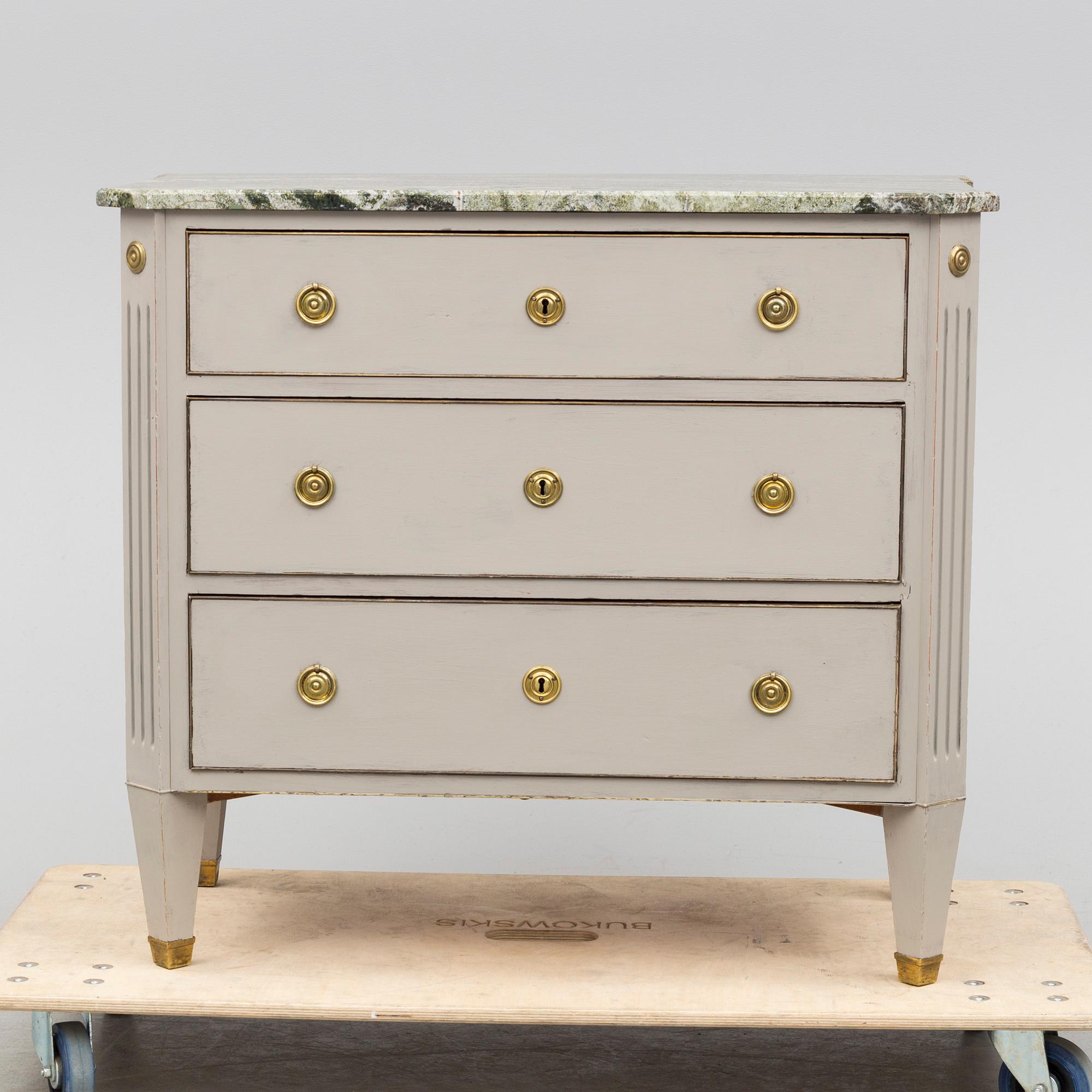 an early 20th century chest of drawers.