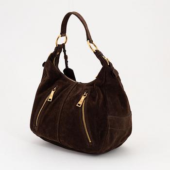 Prada, a brown suede handbag.