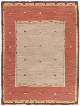 A flat weave carpet, c. 360 x 265 cm.