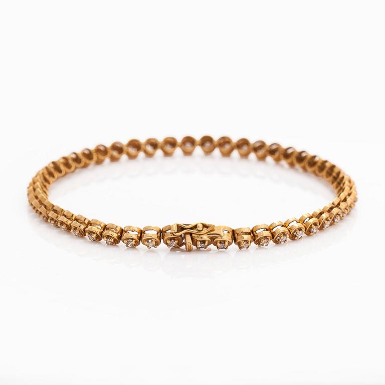 Armband, 18K guld och briljantslipade diamanter.