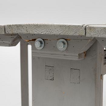 A 19th century gate-leg table.