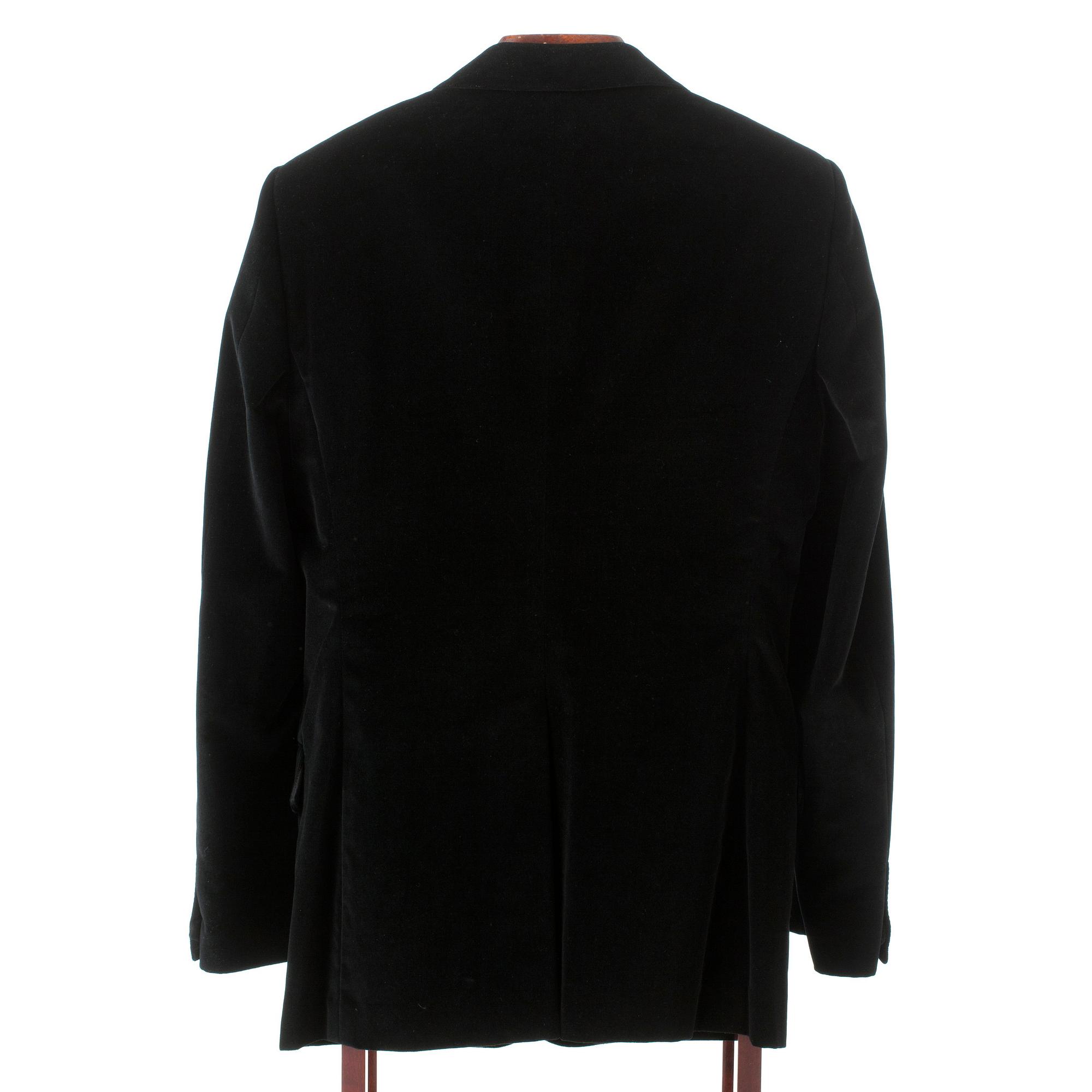 YVES SAINT LAURENT, a black velvet jacket.