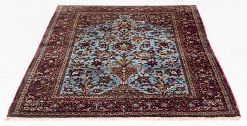 An antique silk Kashan, rug, ca 198,5 x 129,5 cm.