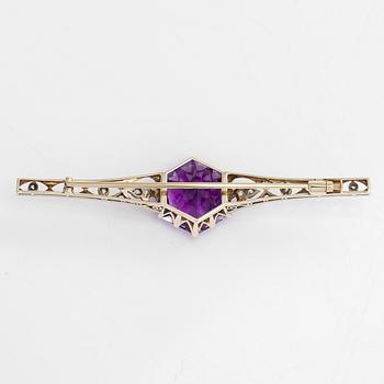 A 14K gold brooch, with an amethyst, old- and rose-cut diamonds,  early 20th century.