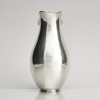 Anton F. Rasmussen, a silver water pitcher with bakelite handle, Aarhus, Denmark, cirka 1950s.