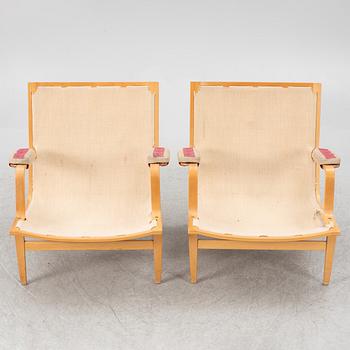 Bruno Mathsson, a pair of "Ingrid" armchairs, Dux, Sweden, second half of the 20th century.