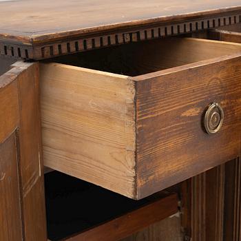 A Gustavian pine cupboard, late 18th century.