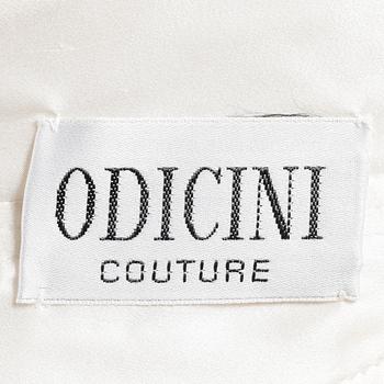 ODICINI COUTURE, a white silk cocktail dress.