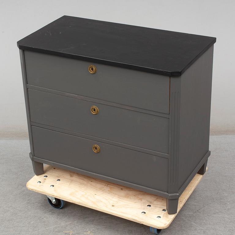 a mid 20th century gustavian style chest of drawers.