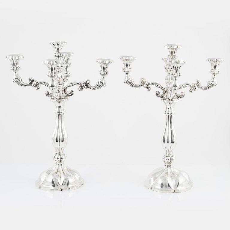 A pair of Austrian silver candelabra, unidentified makers mark, Vienna 1859.