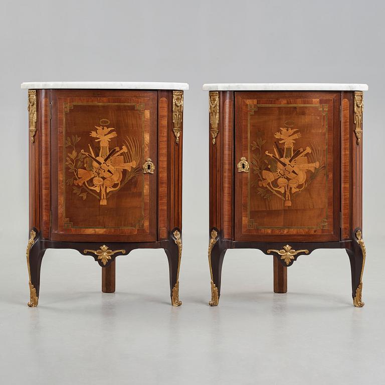 A pair of Louis XVI late 18th century corner cupboards by Léonard Boudin (1735-1804), master in Paris 1761.