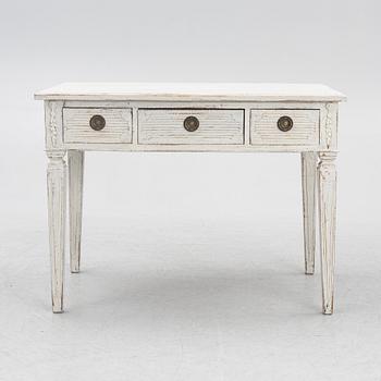 A late 19th century desk and an "Odenslunda" chair from IKEAs 18th century series.