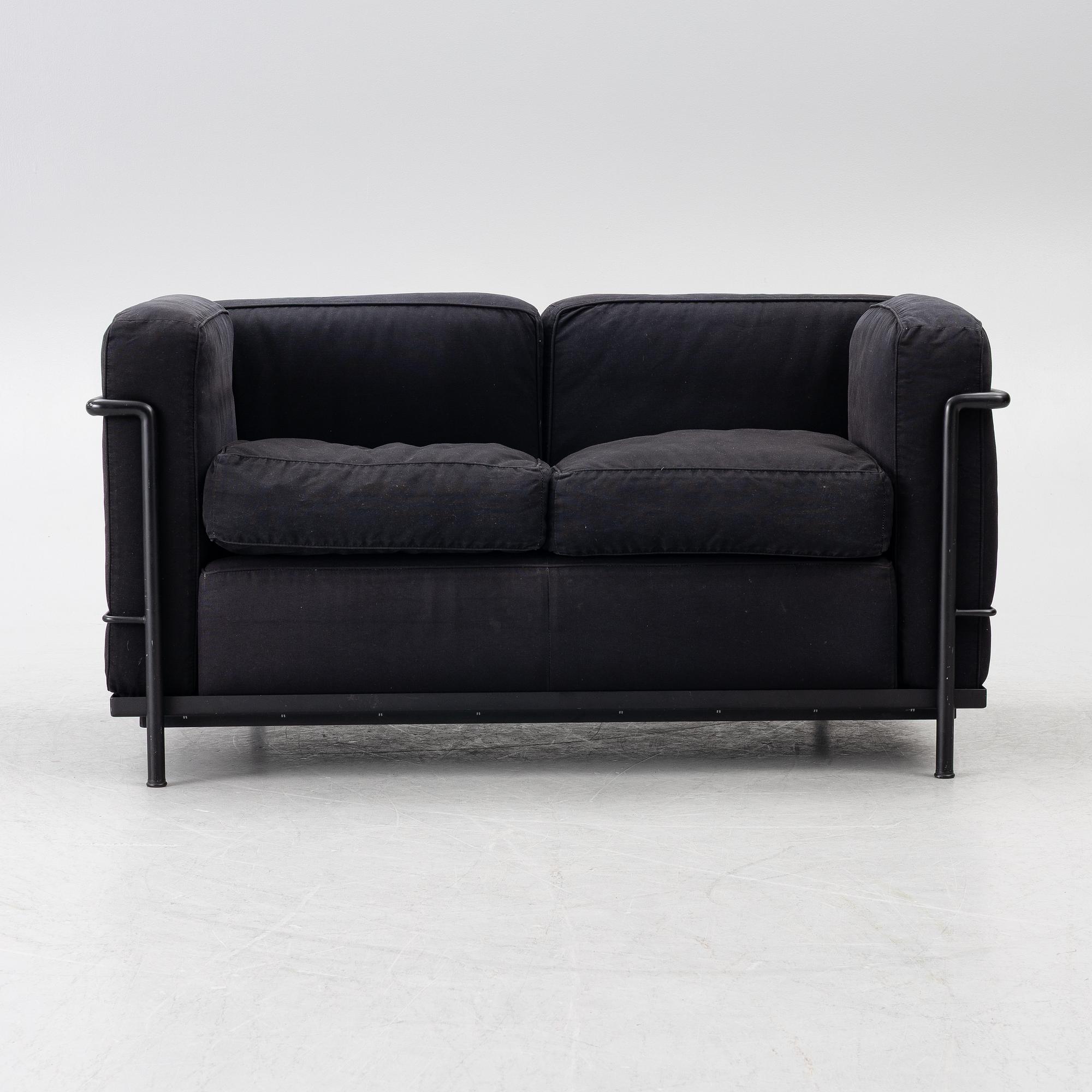 Pierre Jeanneret, Charlotte Perriand & Le Corbusier, an 'LC 2' sofa, Cassina, Italy.