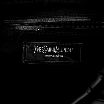 YVES SAINT LAURENT, a black leather shoulder bag.