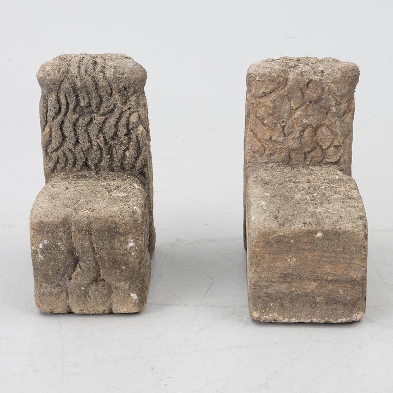 A set of two lion garden sculptures.
