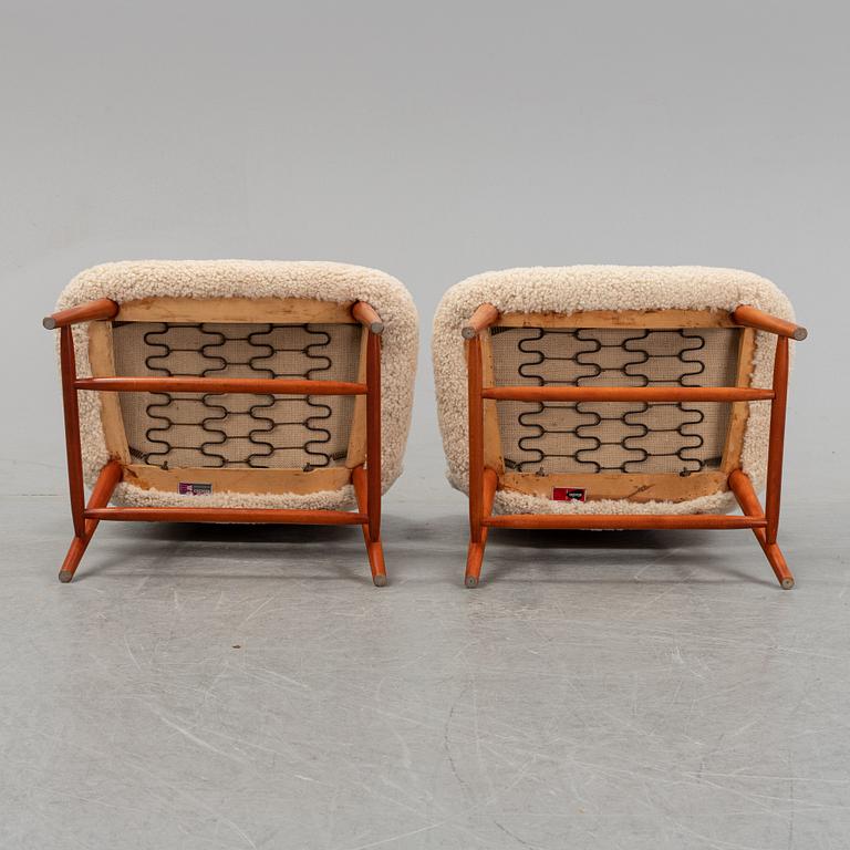 A 1950's pair of 'TeVe' easy chairs by Alf Svensson.