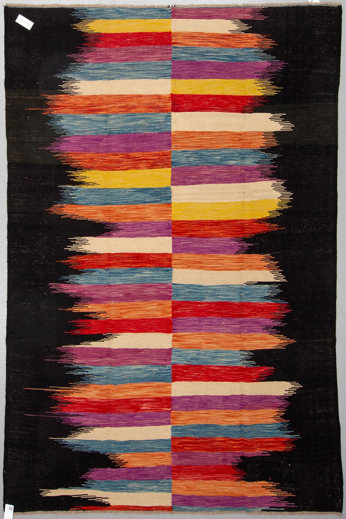 A carpet, kilim 302 x 197.